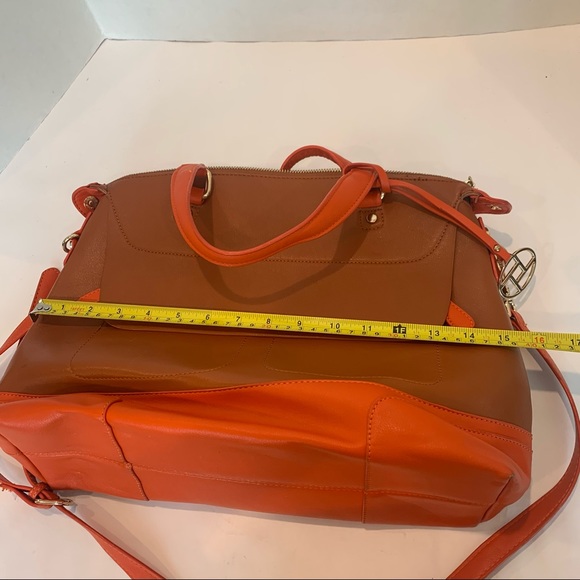 Orange handbag with a rust color body of bag and orange accent shoulder strap - Picture 13 of 16